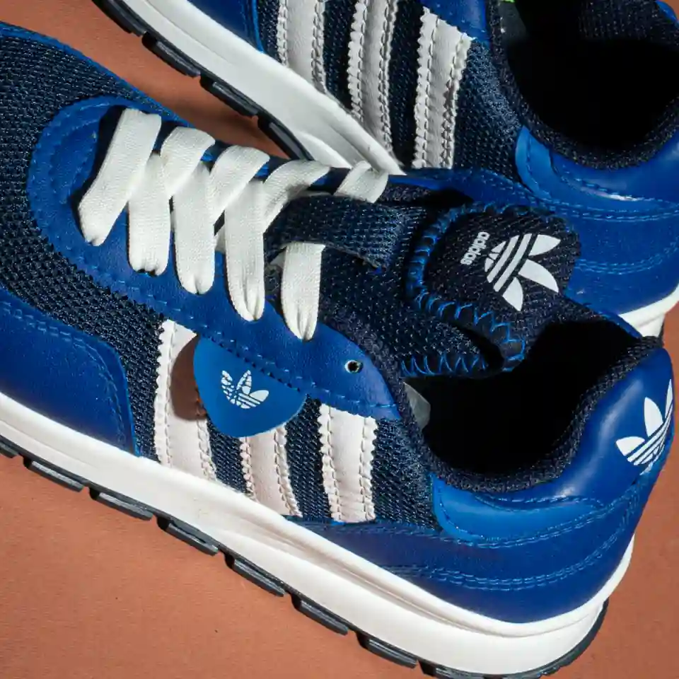 تفاصيل كوتشي اديداس كاجوال مريح بلون بيبسي