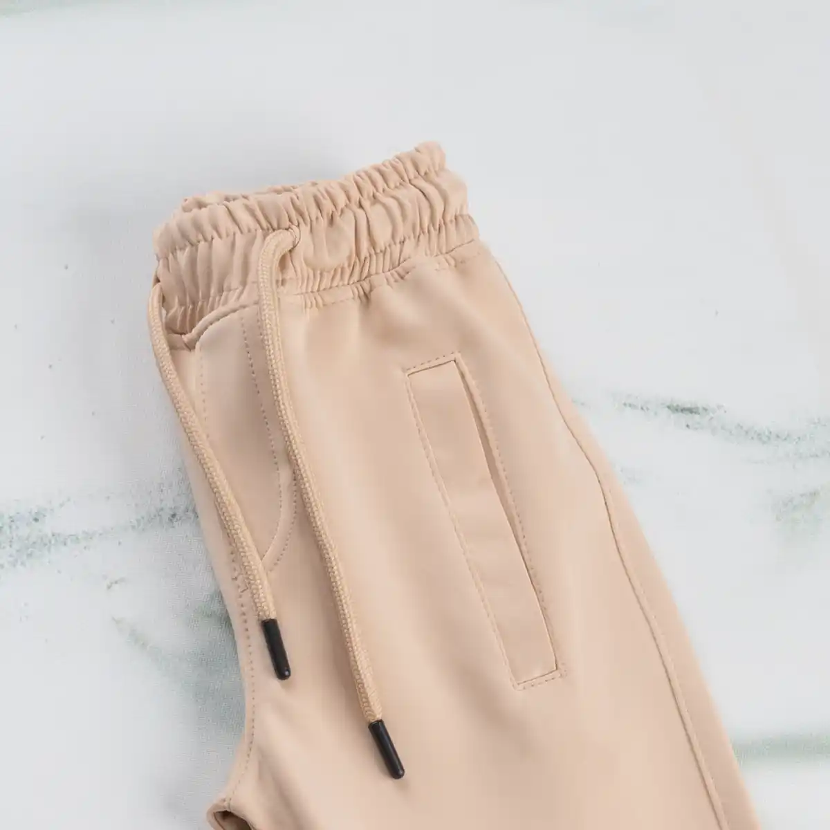kids ne33 beige diving jogger closeup