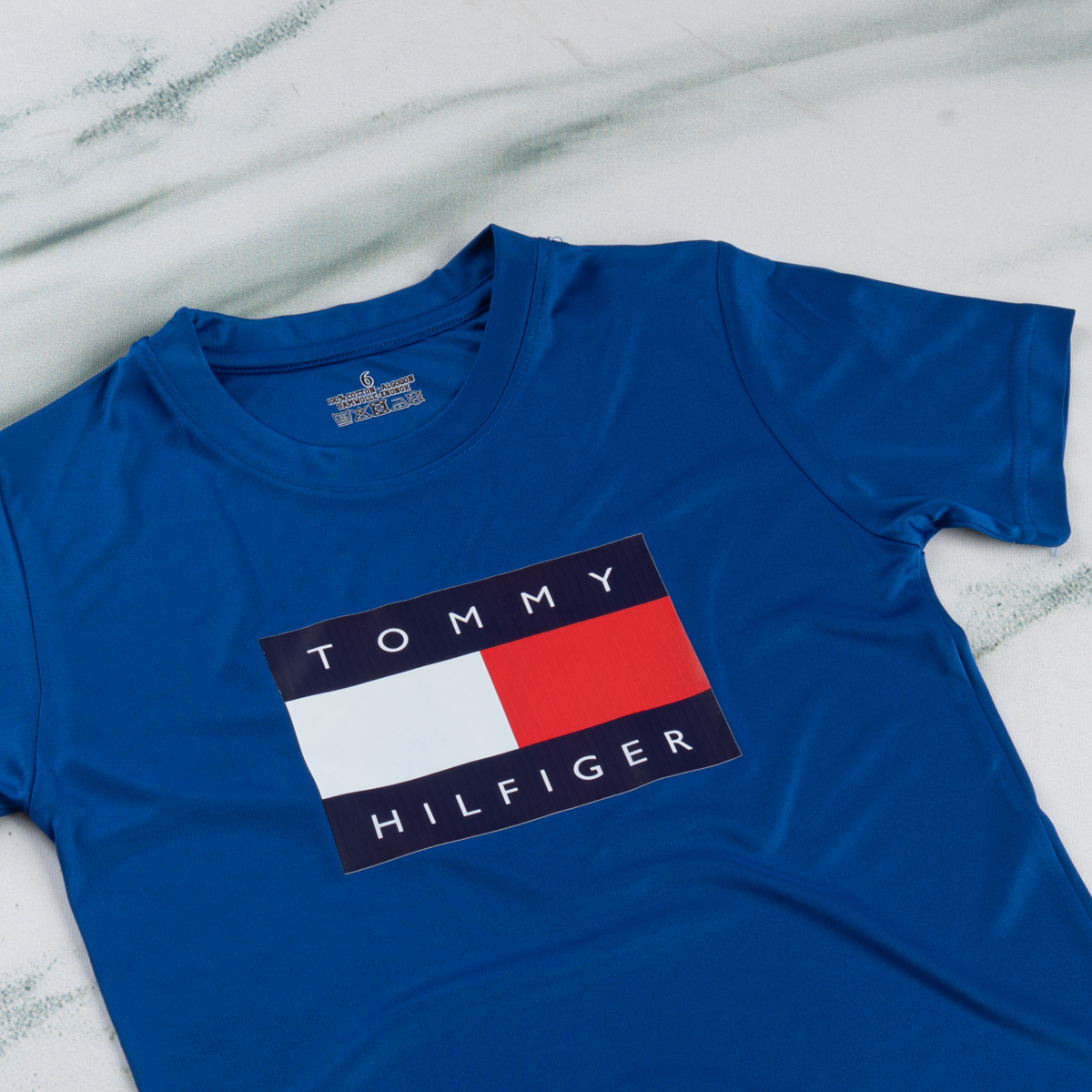 تيشرت TOMMY أطفالي أزرق ملكي تيشرت TOMMY أطفالي أزرق ملكي بخامة روزيتا